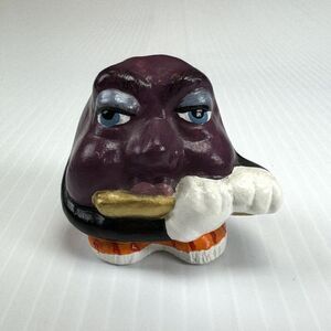California Raisin Ceramic Figurine With Flute